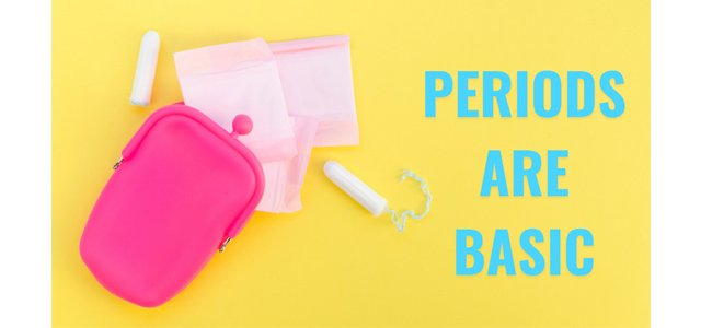 Period products - sanitary pads and tampons inside a woman's purse