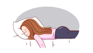 Woman lying on bed in pain from periods